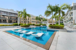 Waves - Stylish 1BR in JVC with Balcony & Pool